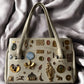 1960s Ivory Leather ‘Gathered Charm’ Bag