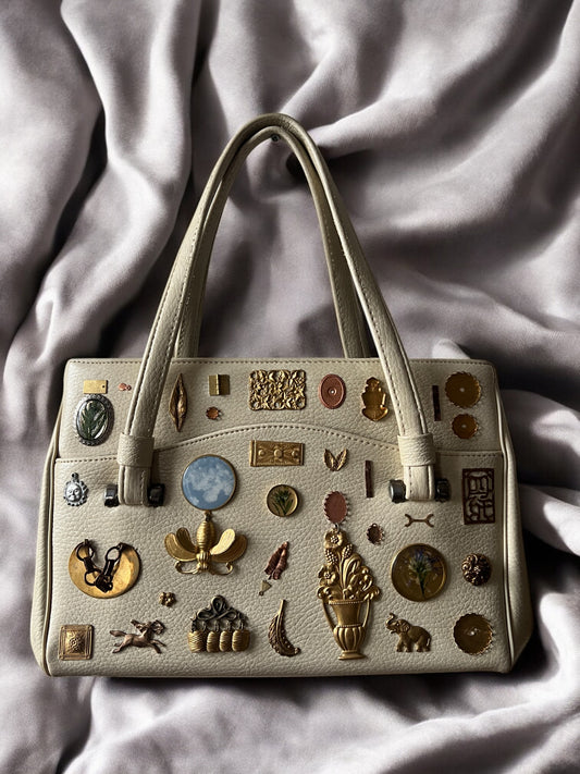 1960s Ivory Leather ‘Gathered Charm’ Bag