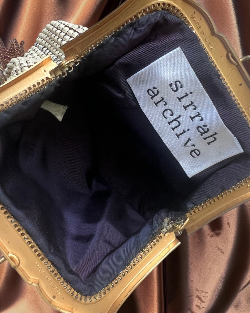Ivory Mesh Tasseled Gathered Charm Bag